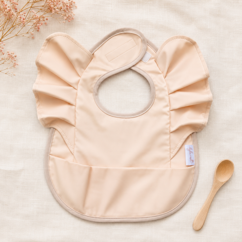 Peach Ruffle Feeding Bib